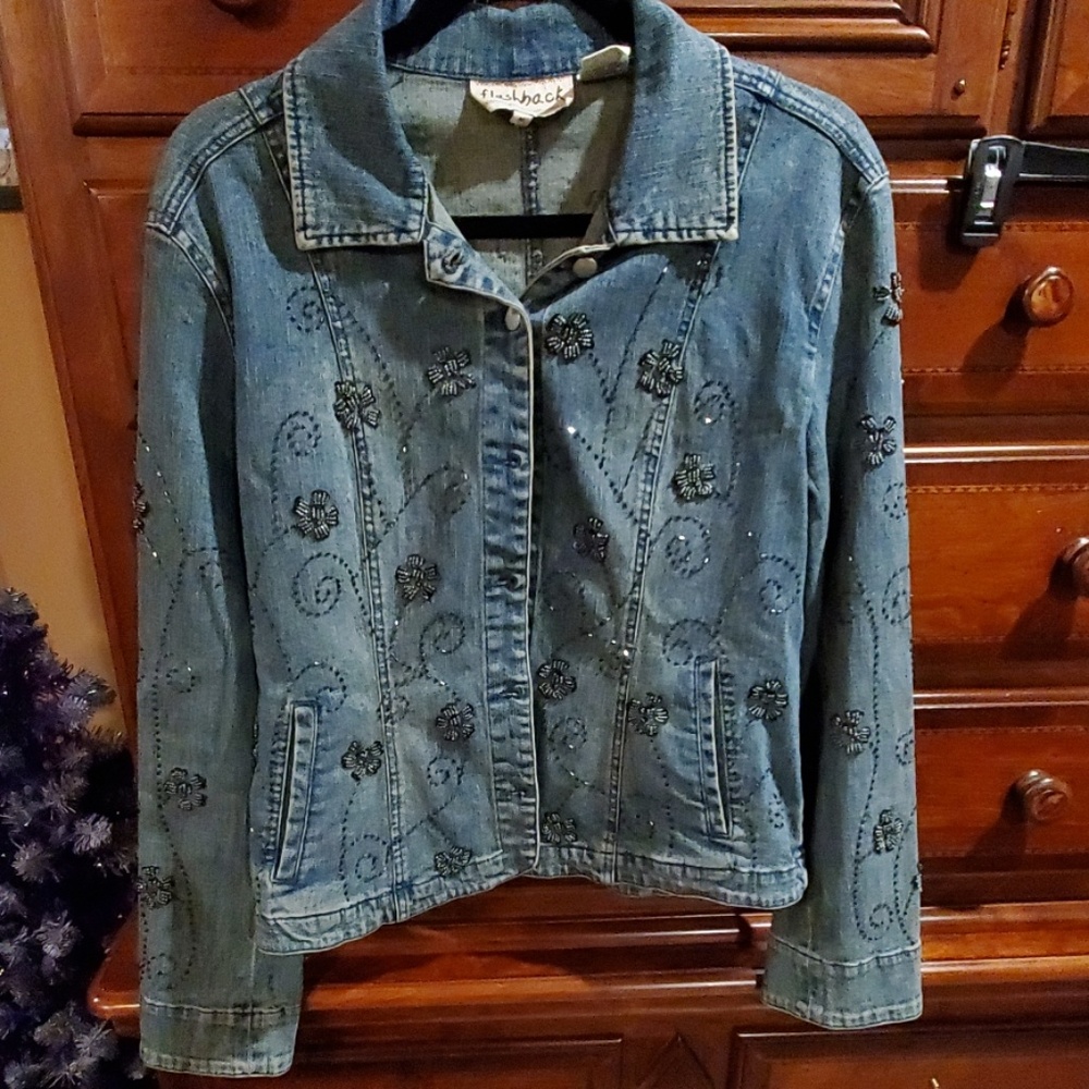Embellished jean jacket.
